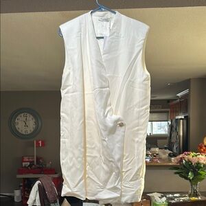 White Sleeveless Vest with Button Detail